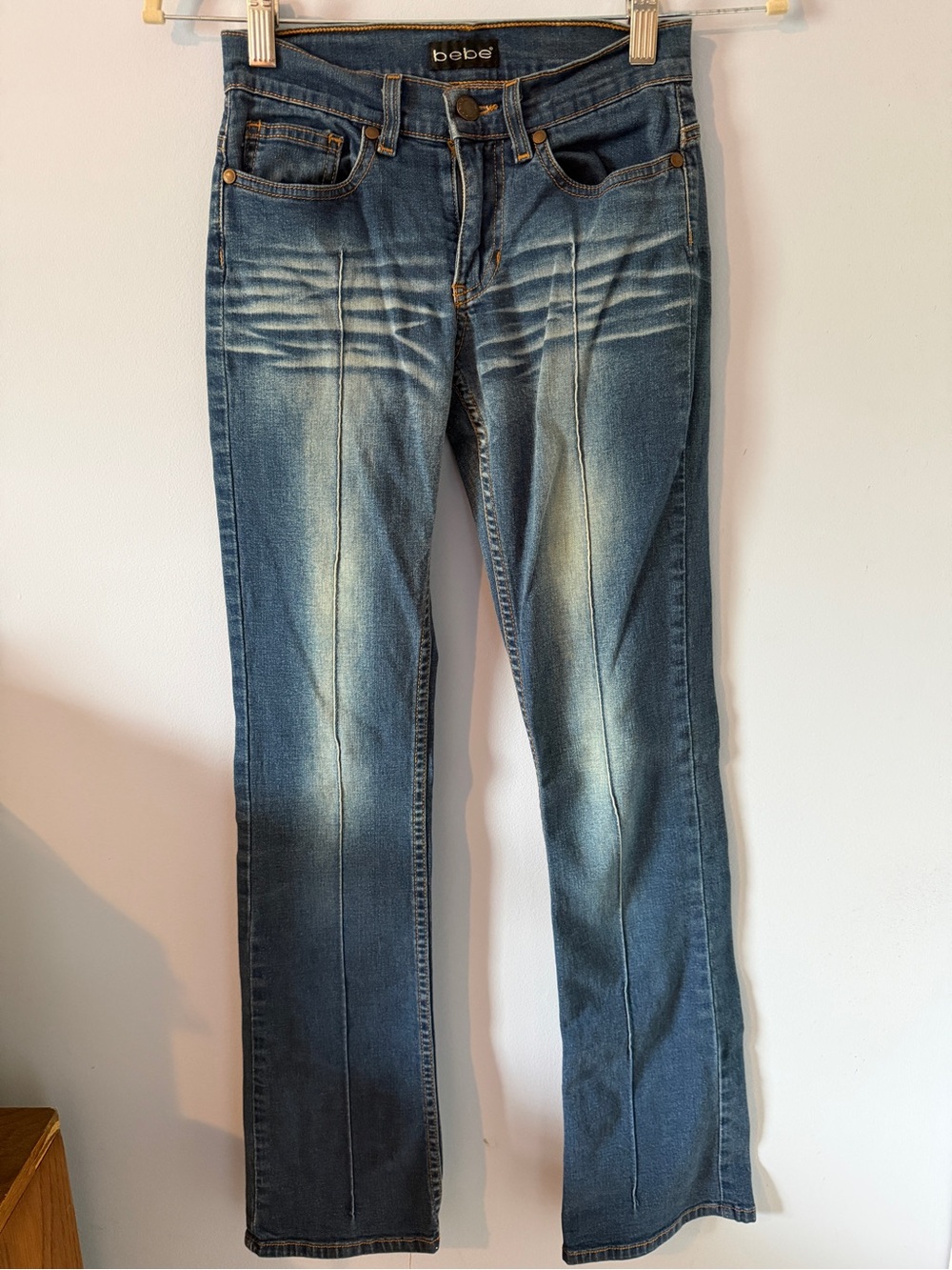 bebe Vintage Ultra Low-Rise Blue Washed Bootcut Jeans